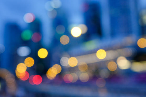 Cityscape with bokeh of the lights at twilight in business district.