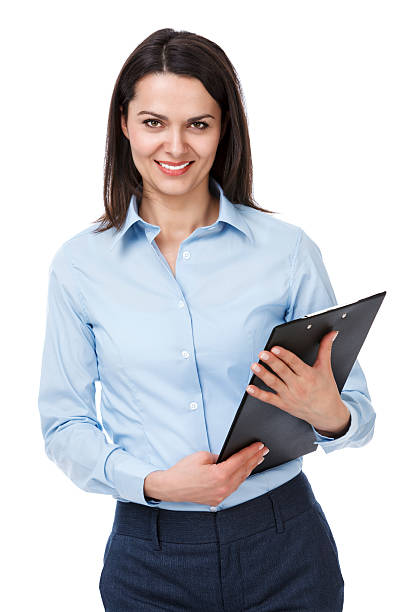 istock Pretty young businesswoman with clipboard 174841120