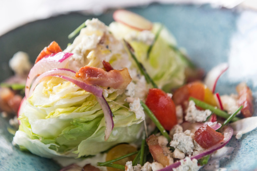 close up picture of a wedge salad