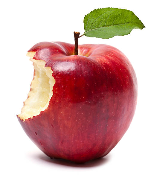 roter apfel mit biss - red delicious apple stock-fotos und bilder