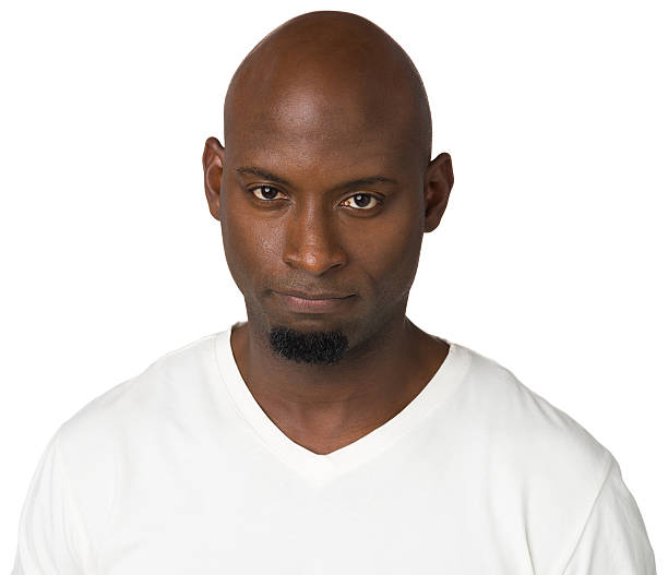 close-up retrato de homem sério - serious african ethnicity mid adult bright - fotografias e filmes do acervo