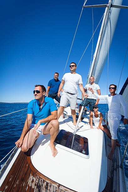 istock Caucasian man posing on the sailboat 174842808