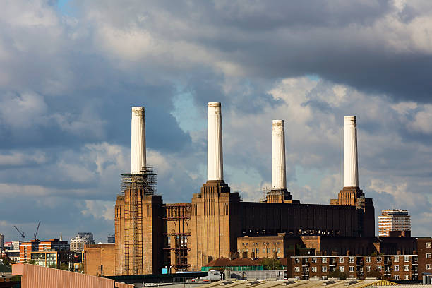 Battersea Power Station Distant view of the Battersea Power Station in London window chimney london england residential district stock pictures, royalty-free photos & images