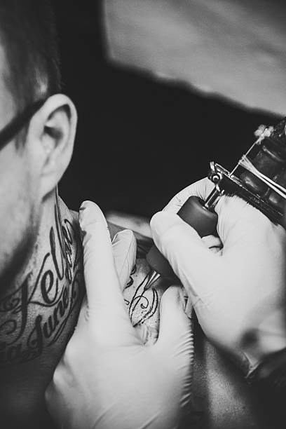 istock Neck Tattoo Artist Lettering 174843620