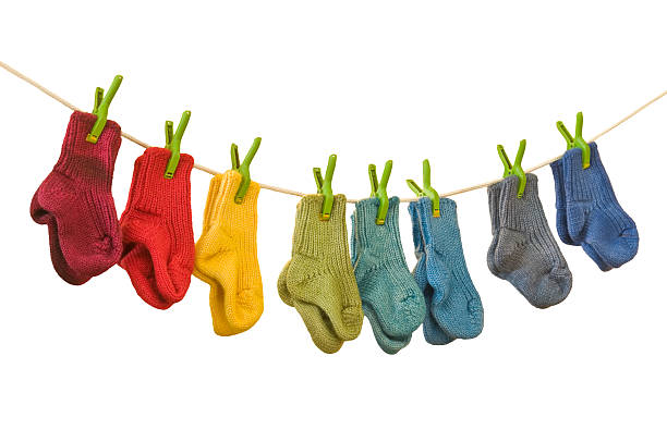 istock Colorful socks on a clothesline 174843713