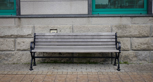 istock A vintage bench with stone wall at sunny day 1748437548