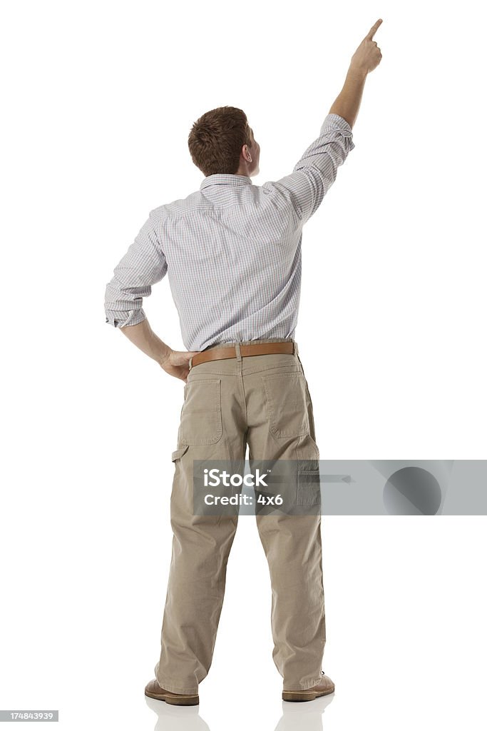 Vista traseira de um homem apontando para cima - Royalty-free 20-29 Anos Foto de stock