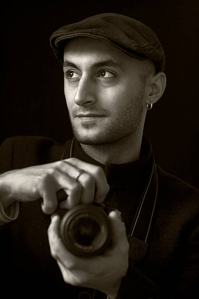 istock Young man photographer 174843978