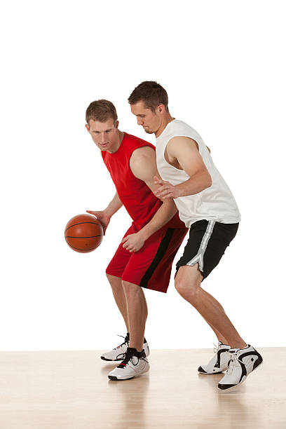 istock Basketball players in action 174844052