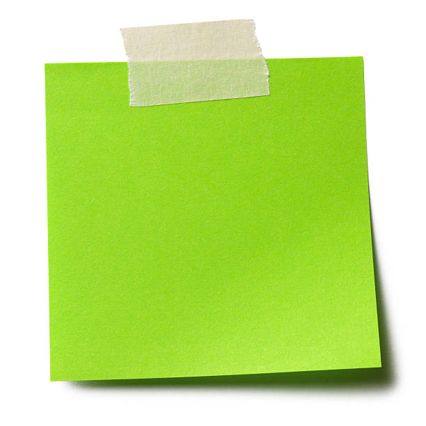 Green adhesive note stock photo