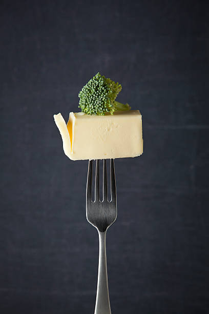 How about some broccoli with your butter stock photo