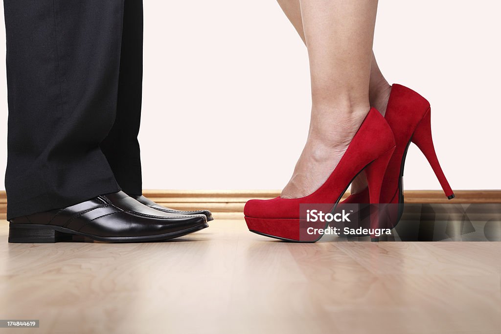 Attraction Man's and woman's legs in front of each otherSome other related images: Beauty Stock Photo