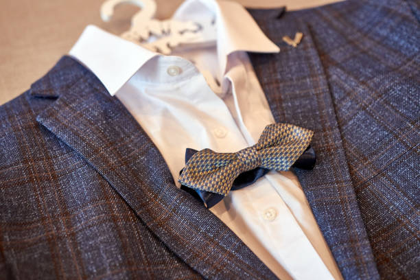 istock Elegant suit with a shirt on a hanger. Preparing for the celebration. 1748447246