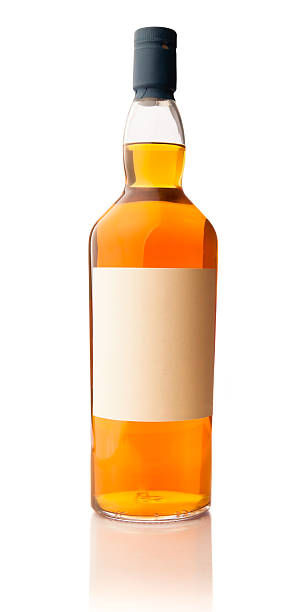 Whiskey Bottle XXXL "A bottle of whisky with a blank label, isolated on white. XXXLargeBottles Series;" cognac region photos stock pictures, royalty-free photos & images