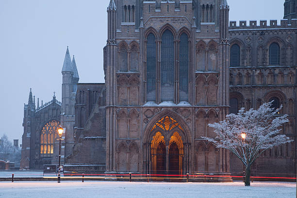 Ely Cathedral in the snow "|The entrance to Ely Cathedral, Cambridge, UK, England," cambridge england photos stock pictures, royalty-free photos & images
