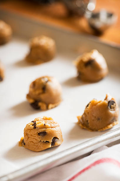 istock Peanut Butter Chocolate Chip Cookie Dough on a Baking Sheet 174845105