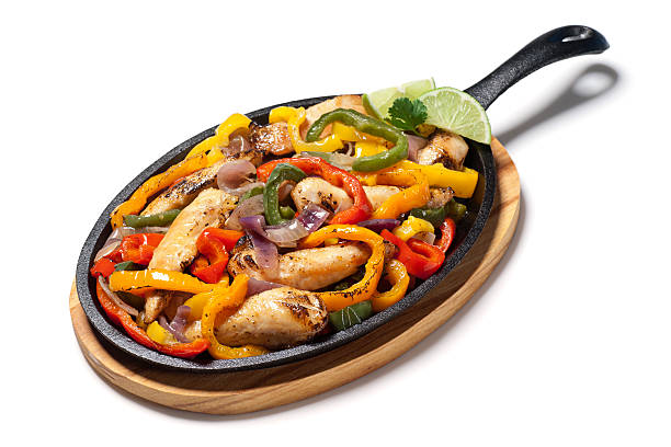 fajitas de pollo - mexican pots fotografías e imágenes de stock