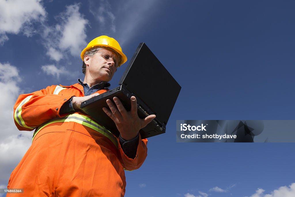 Auftragnehmer und Computer - Lizenzfrei Bergmann Stock-Foto