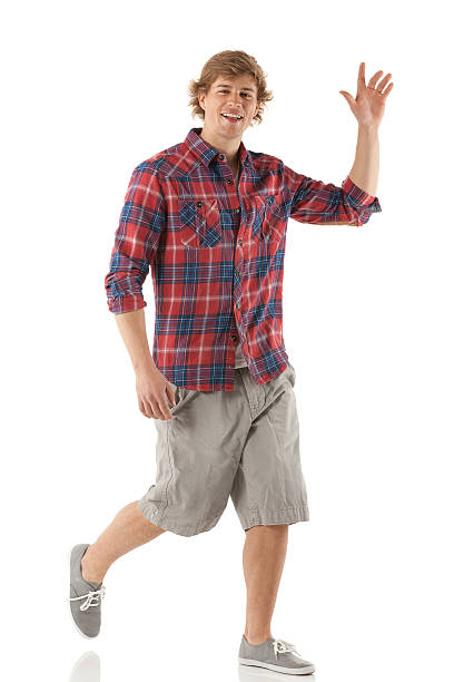 istock Young man walking and waving hands 174845472