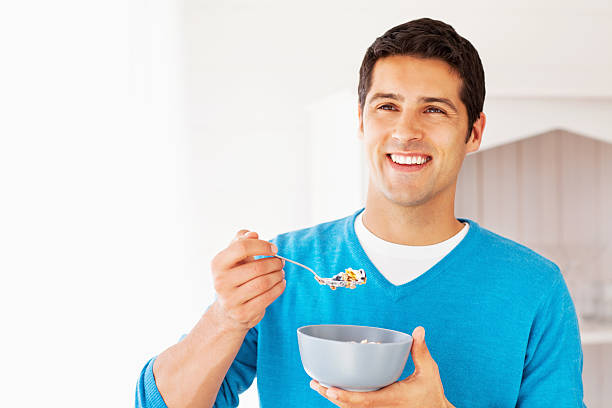 istock Happy Man Having Bowl Of Cereals 174845863