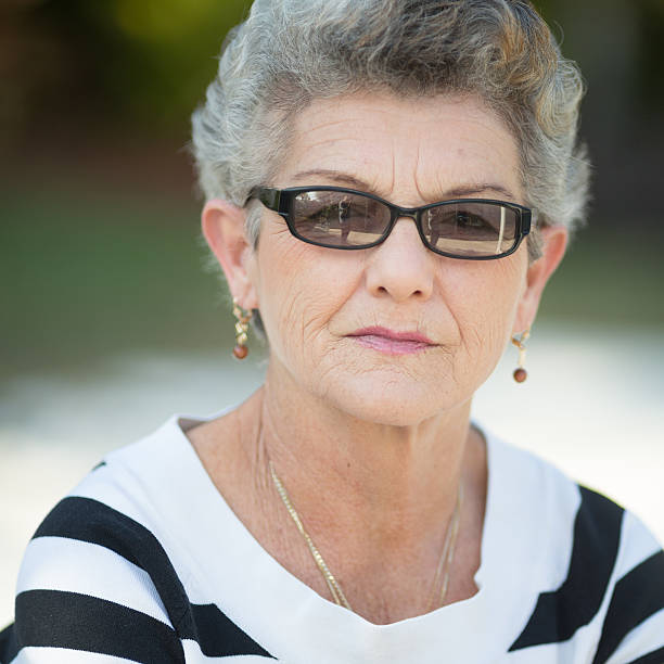 istock elegant senior woman portrait 174846207