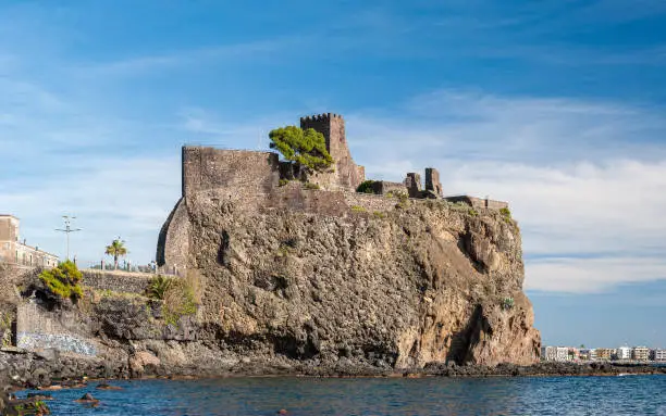The norman castle of Aci Castello in eastern Sicily, built on a lava rock promontory