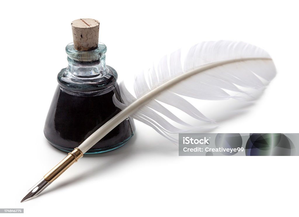 Ink and feather pen Ink bottle and feather quill pen on white background Quill Pen Stock Photo