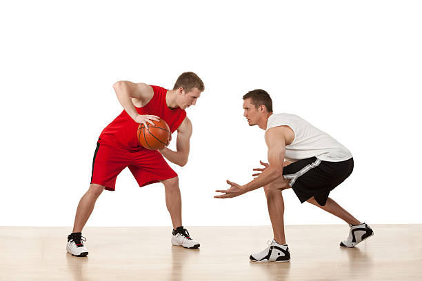 istock Two sportsmen playing basketball 174846898