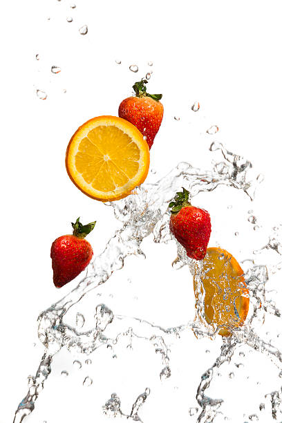 istock Strawberries and orange slices in a water splash 174847400