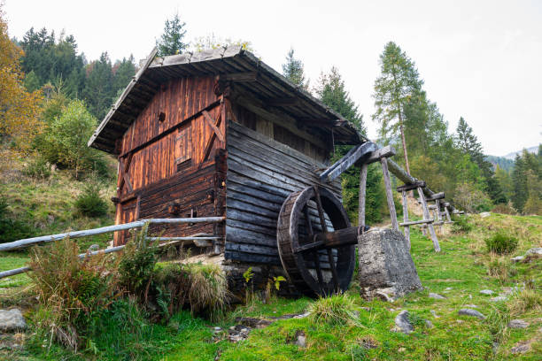 Ancient wooden water mill on a mountainside near the place of Terenten (Italian: Terento) in South Tyrol, Italy.