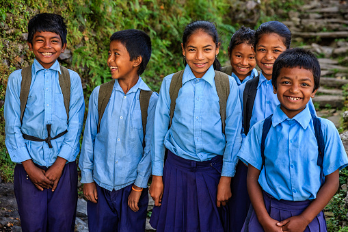 Group of Nepali school children in village in Annapurna Conservation Area.. The Annapurna region is in western Nepal where some of the most popular treks (Annapurna Sanctuary Trek, Annapurna Circuit) are located. Peaks in the Annapurnas include 8,091m Annapurna I, Nilgiri and Machhapuchchhre. The Annapurna peaks are among the world's most dangerous mountains to climb.