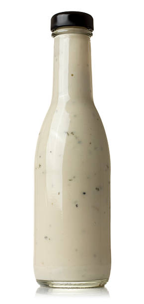 istock Glass bottle of ceasar salad dressing on a white background 174847578