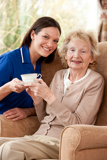 istock Old Lady and Carer 174847581