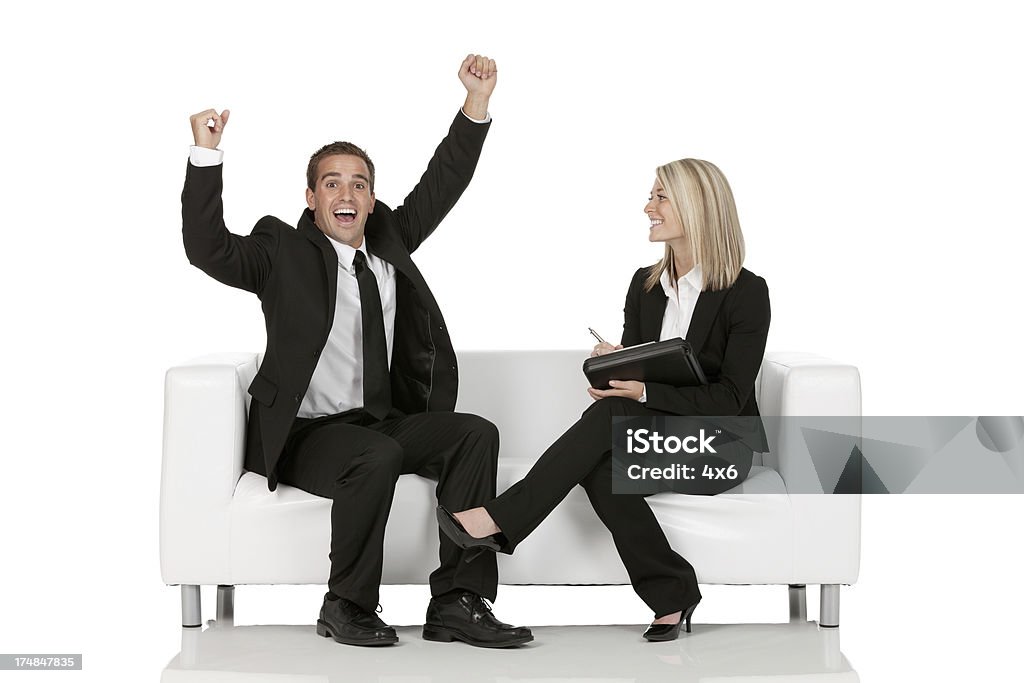 Excitación ejecutivo con su secretario - Foto de stock de Entusiasmo libre de derechos