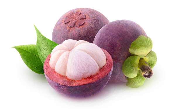 Halved mangosteen fruits isolated on white