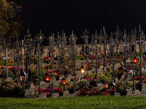 Old cemetery with candle lights.