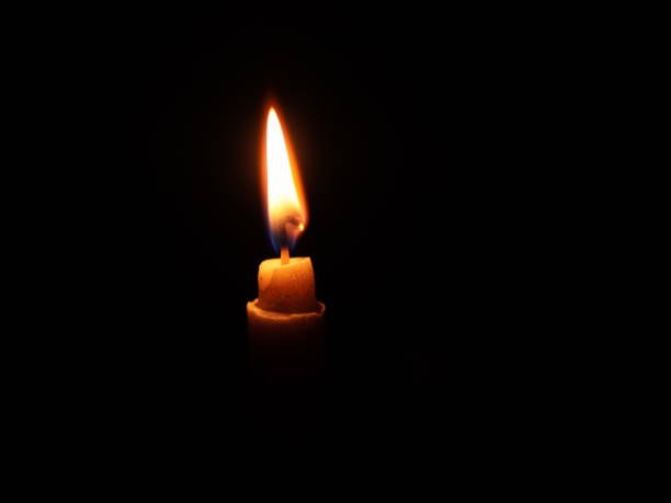 istock candle flame in the dark 1748487117