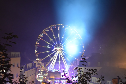 Mayen, Germany - 10 17 2023: Lukasmarkt, the annual autumn market during the night in the old town of Mayen