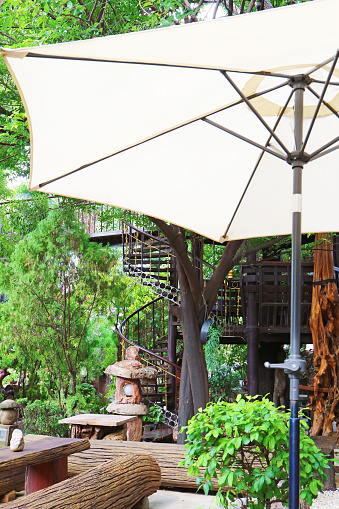 Tranquil Oriental Garden with a White Umbrella