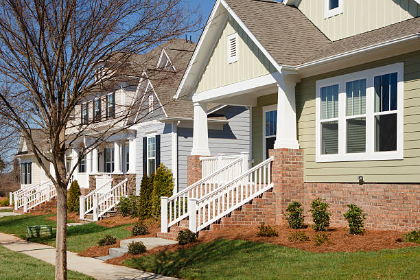 istock Row of newly constructed bungalow style homes 174849281