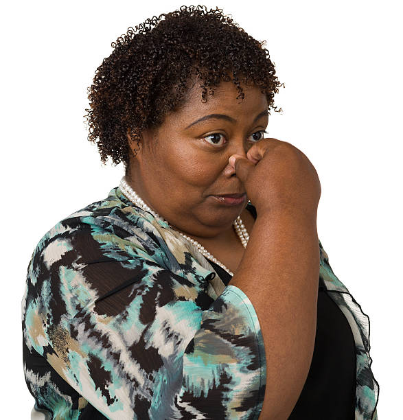istock Woman Pinching Her Nose 174849297