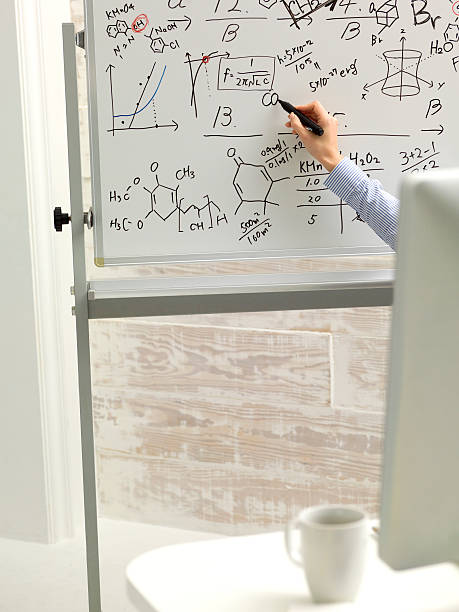 istock Female hand writing on white board expertise. 174849413