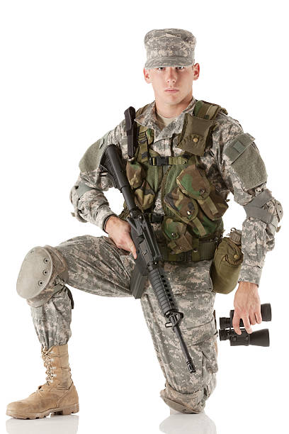 istock Soldier with machine gun and binoculars 174849466