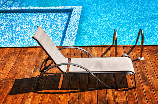 istock Empty Sun Lounger by Outdoor Swimming Pool 174850348