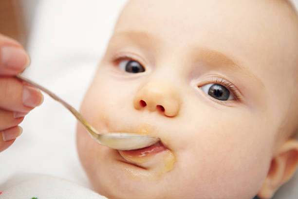 istock Feeding of the baby. 174850515