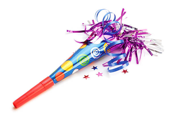 Party Noise Maker Party Noise Maker and confetti on white background party blower stock pictures, royalty-free photos & images