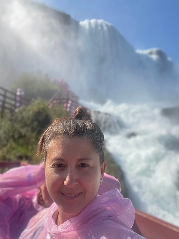 Woman at Niagara Falls taking a selfie
