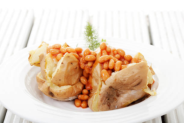 baked potato and beans stock photo