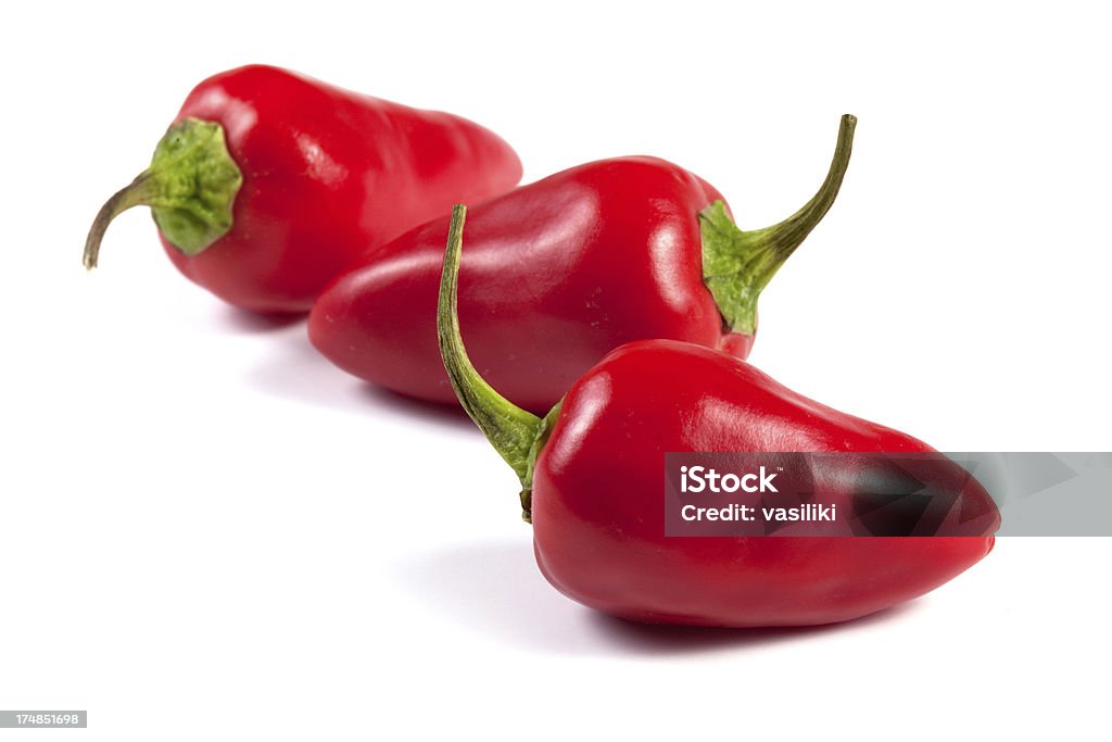 Três pimentas vermelhas - Foto de stock de Calor royalty-free