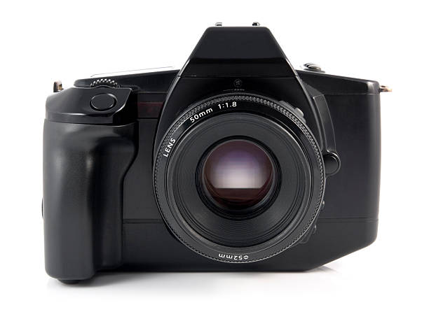 istock Old SLR 35mm film camera isolated on a white background 174852508